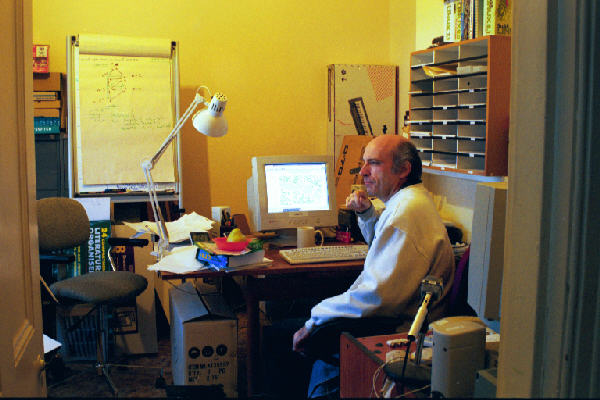 photo of AK sitting in the Topoz office