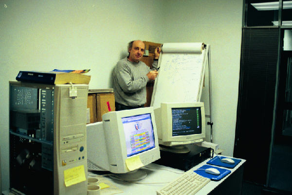 photo of AK at clipboard in old Topoz office
